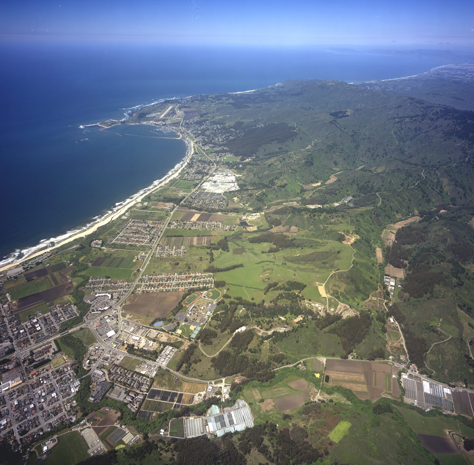 Aerial shot of ocean-front land