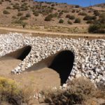 Drainage culverts under an access road