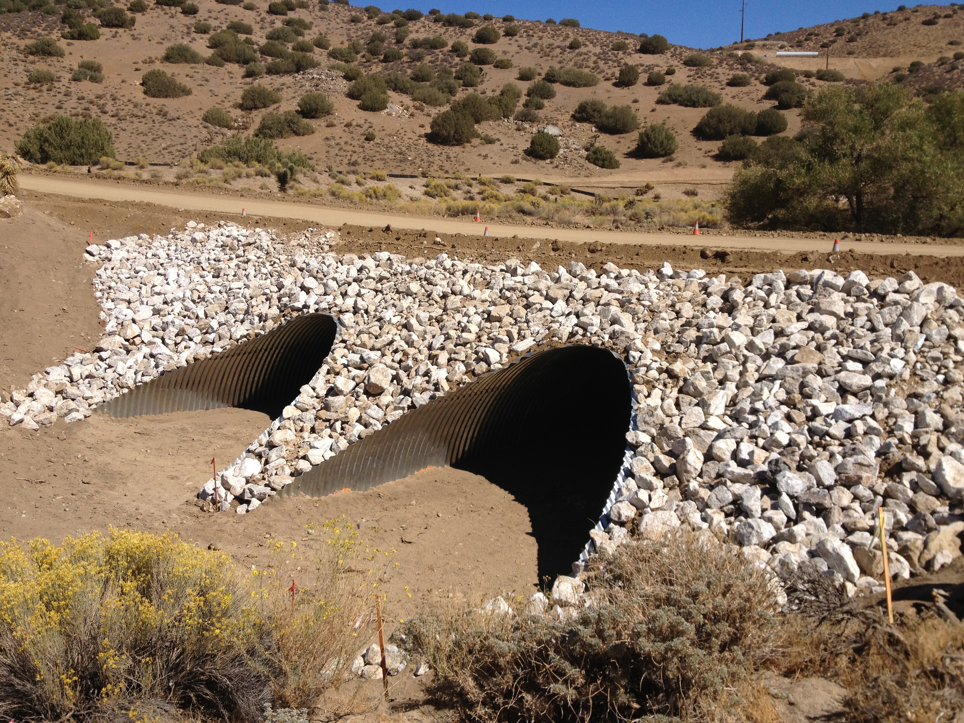 Drainage culverts under an access road
