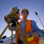 Surveyor with the sun at his back